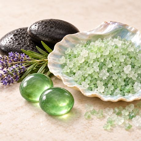 River stones, lavender and green bath salts in a shell